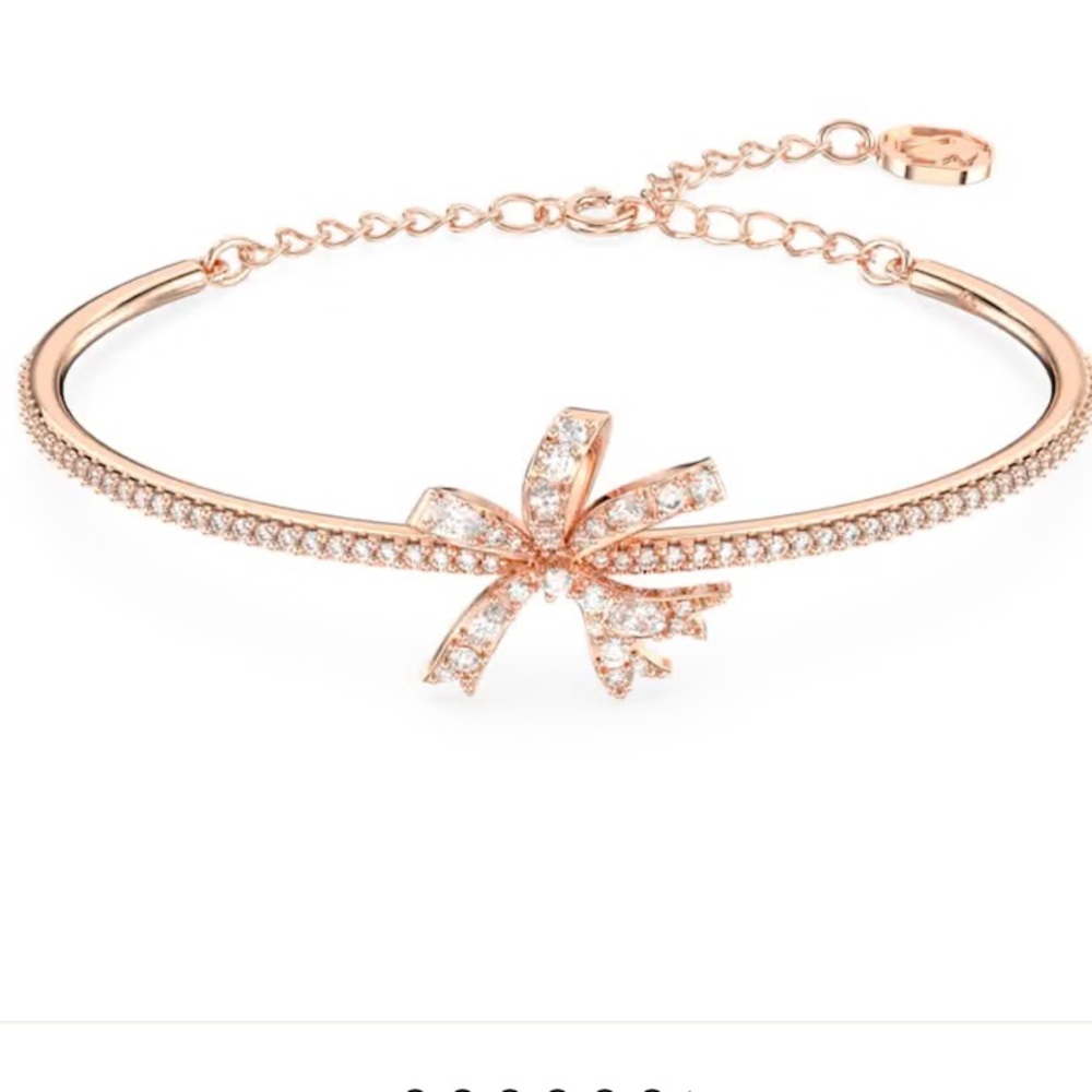 Swarovski nwot Volta rose gold tone plated Bow Bangle
